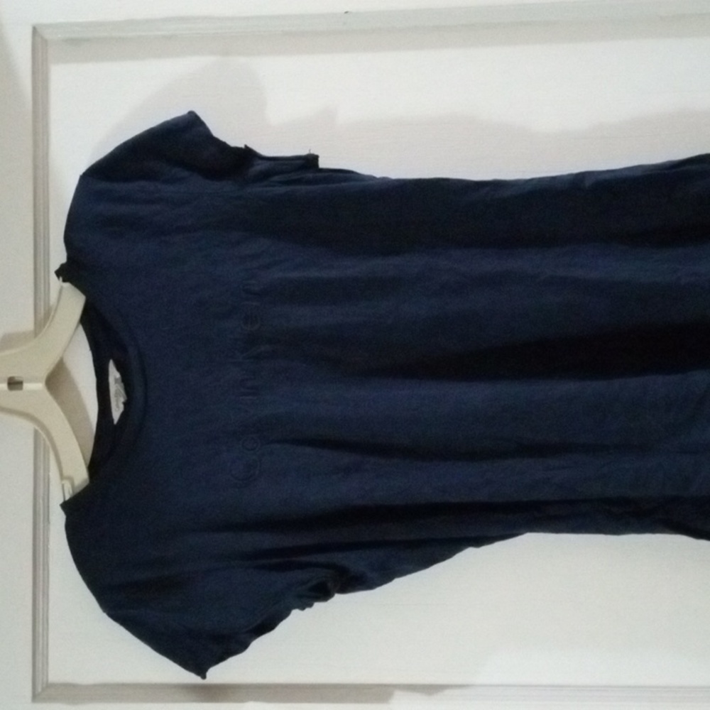Calvin Klein size small dark blue short sleeve shirt